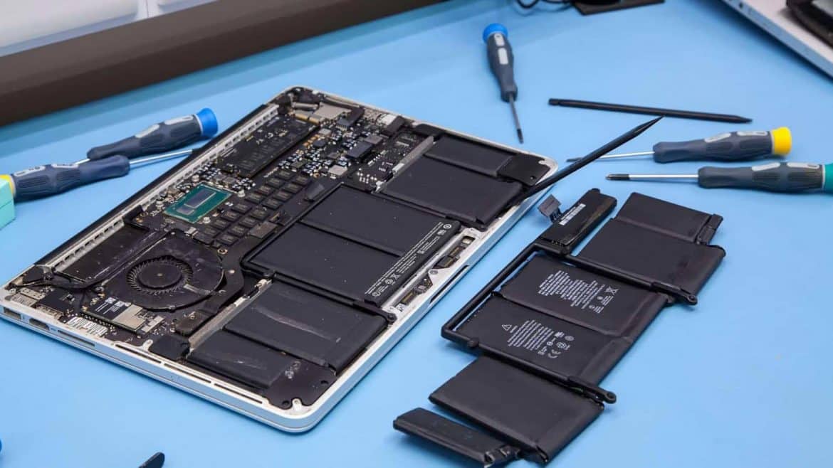 MacBook opened up for repair on the workbench